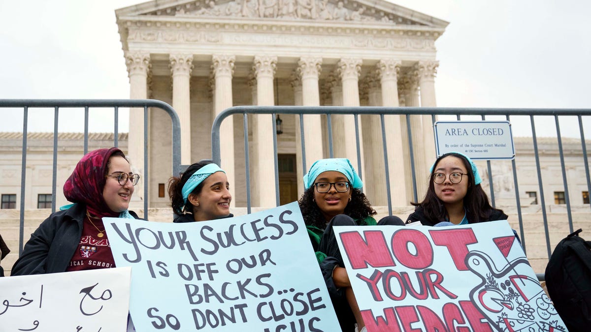 Oct. 31, 2022; Washington, DC, USA. Protestors gather outside as the U.S. Supreme Courts hears oral arguments in two affirmative action college admission cases on October 31, 2022. The two lawsuits from Students for Fair Admissions, an anti-affirmative action group founded by conservative legal strategist Edward Blum, accuse the University of North Carolina and Harvard of discriminating against Asian American students and giving   unfair preference to Black and Hispanic applicants – challenging decades of legal precedent. In the lawsuit against UNC, the group says the school also discriminated against white applicants. Mandatory Credit: Jack Gruber-USA TODAY ORG XMIT: USAT-512519 ORIG FILE ID:  20221031_ajw_usa_042.JPG