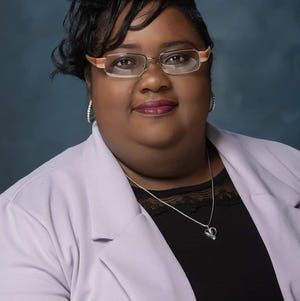 Simoné Sanders, 40, of Corpus Christi, Texas, had put aside college studies to help ailing relatives but still amassed college debt. Now working in government relations for Texas' General Land Office, she hoped to find relief from about $18,000 in loan debt through President Joe Biden's loan forgiveness program.