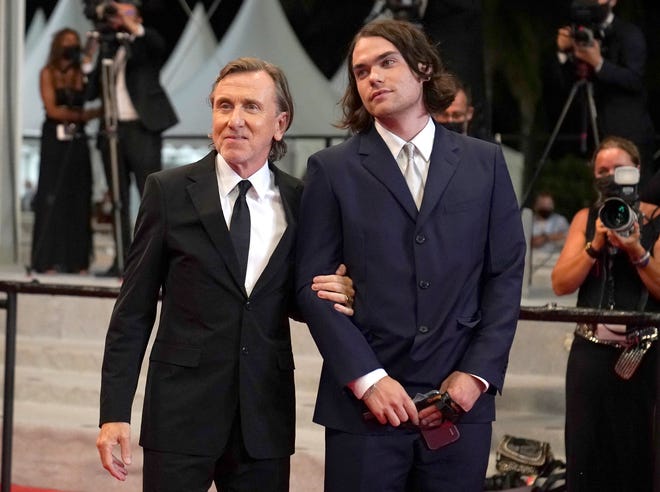 Tim Roth, left, and his son Cormac Roth appear at the premiere of the film "Bergman Island" at the 74th international film festival, Cannes, southern France, on July 11, 2021. Cormac Roth, a musician and son of actor Tim Roth, died Oct. 16, 2022 after a battle with cancer, the family announced Monday. He was 25.