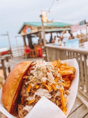 The pulled pork sandwich is one of the popular selections on the new menu at Carolina Beach Pier.