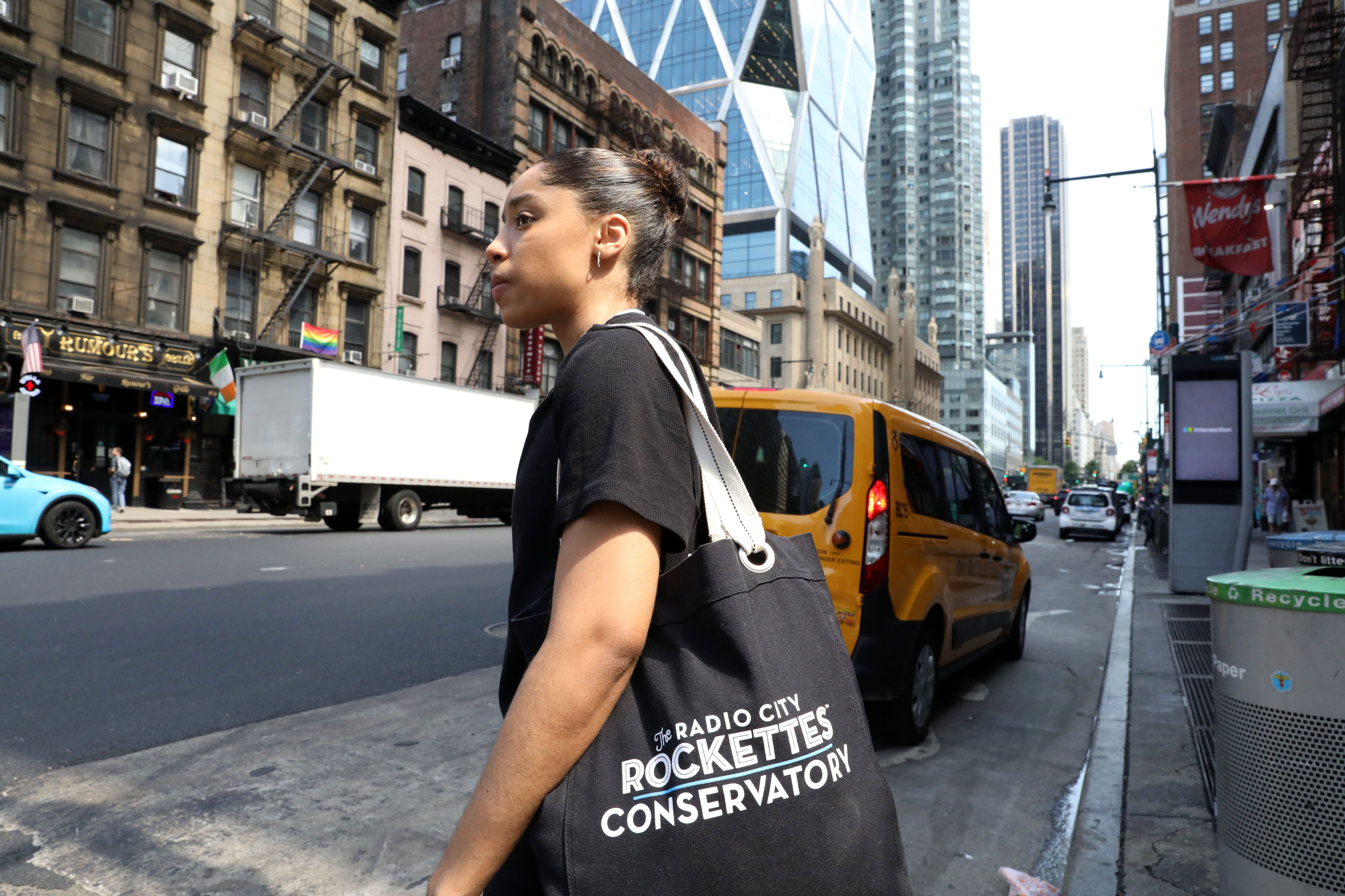 Rockette hopeful Sasha Bass-Ulmer, 22, of Chicago, Illinois, walks to The Ailey School, where she is a student, July 27, 2022 in Manhattan. 