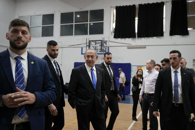 Likud party chairman Benjamin Netanyahu arrives to polling station during Israeli elections in Jerusalem, on Nov. 1, 2022.
