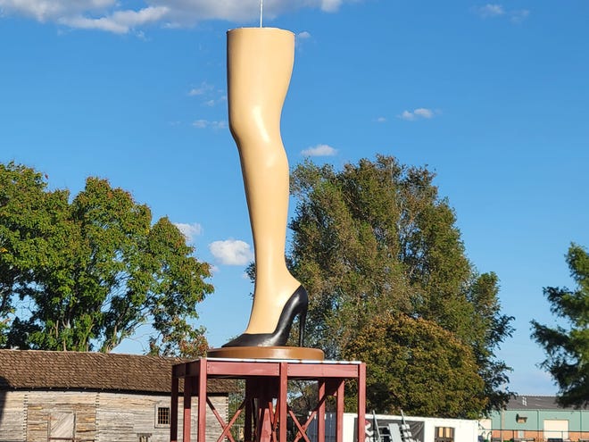 A 50-foot-tall leg lamp sculpture inspired by the 1983 cult-favorite film "A Christmas Story" is under construction in a new park in downtown Chickasha on Sept. 20, 2022. The completed leg lamp, which has since had its lampshade added, will be dedicated as part of Phase 1 of the park project on Nov. 5.