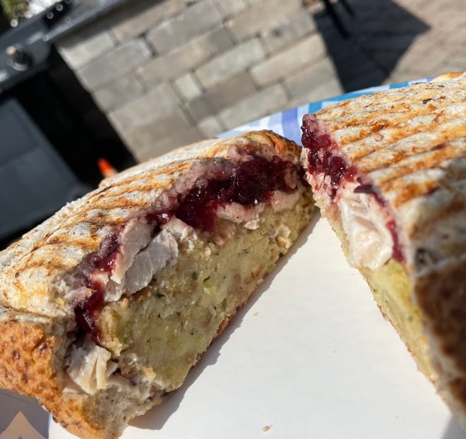 The Harvest Joe, a crispy pressed sandwich, has roasted turkey, stuffing, cranberry sauce, bacon and ranch on multigrain bread, from The Local Market & Kitchen in Ship Bottom.