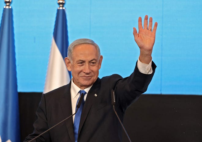 Former Israeli Prime Minister and Likud party leader Benjamin Netanyahu speaks to supporters at campaign headquarters in Jerusalem early on November 2, 2022, after voting for the national elections has ended.