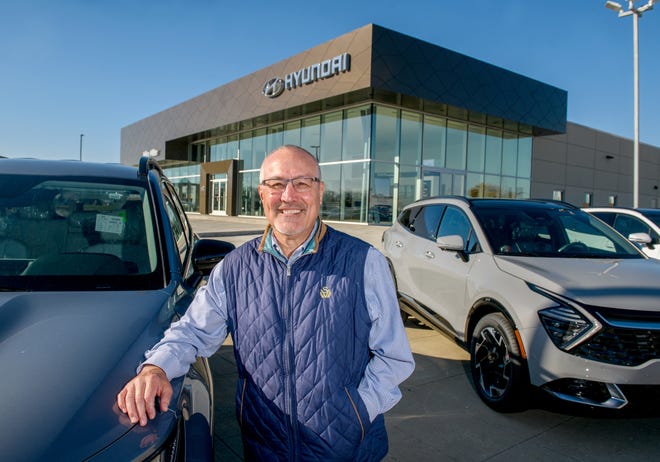 MIke Miller stands outside his new 23,500-square-foot Hyundai dealership next door to his old Kia dealership on Pioneer Parkway in Peoria. Construction started on the new facility in September of 2021, and plans call for the dealership to open for business Nov. 7.