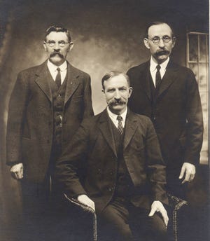 John Wessels (seated) with brothers Jons and Fred.