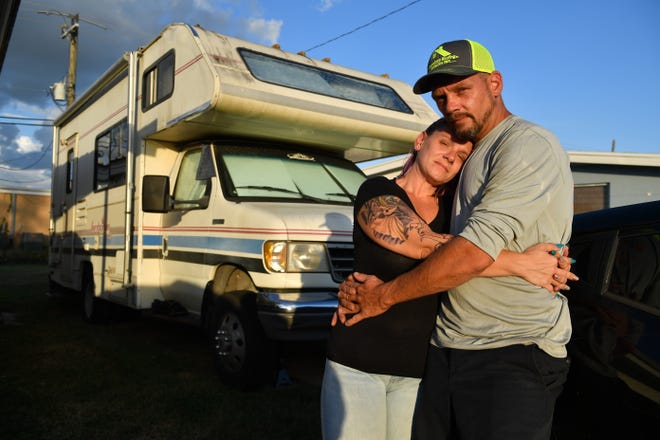Jessica and Rusty Foltz have been staying in a borrowed 1994 Jamboree RV, parked next to her mother’s home in Port Charlotte. The home they were renting in Sarasota County near the Myakka River was flooded after Hurricane Ian.