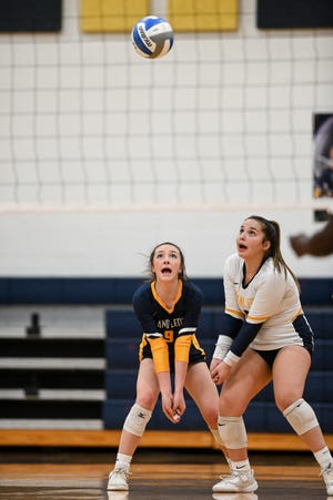 Grand Ledge's Sienna Lake, left, and Isabel Gonzalez go after the ball during the district semifinal match against Everett on Wednesday, Nov. 2, 2022, at Grand Ledge High School.