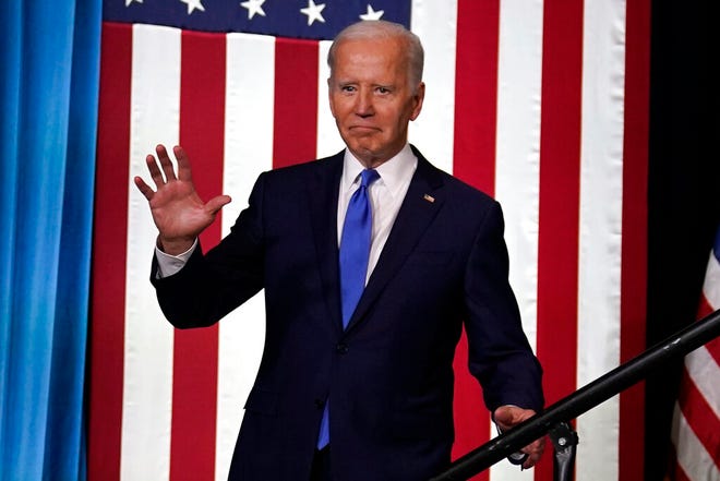 President Joe Biden waves as he arrives to speak about threats to democracy ahead of next week's midterm elections, Wednesday, Nov. 2, 2022, at the Columbus Club in Union Station, near the U.S. Capitol in Washington.