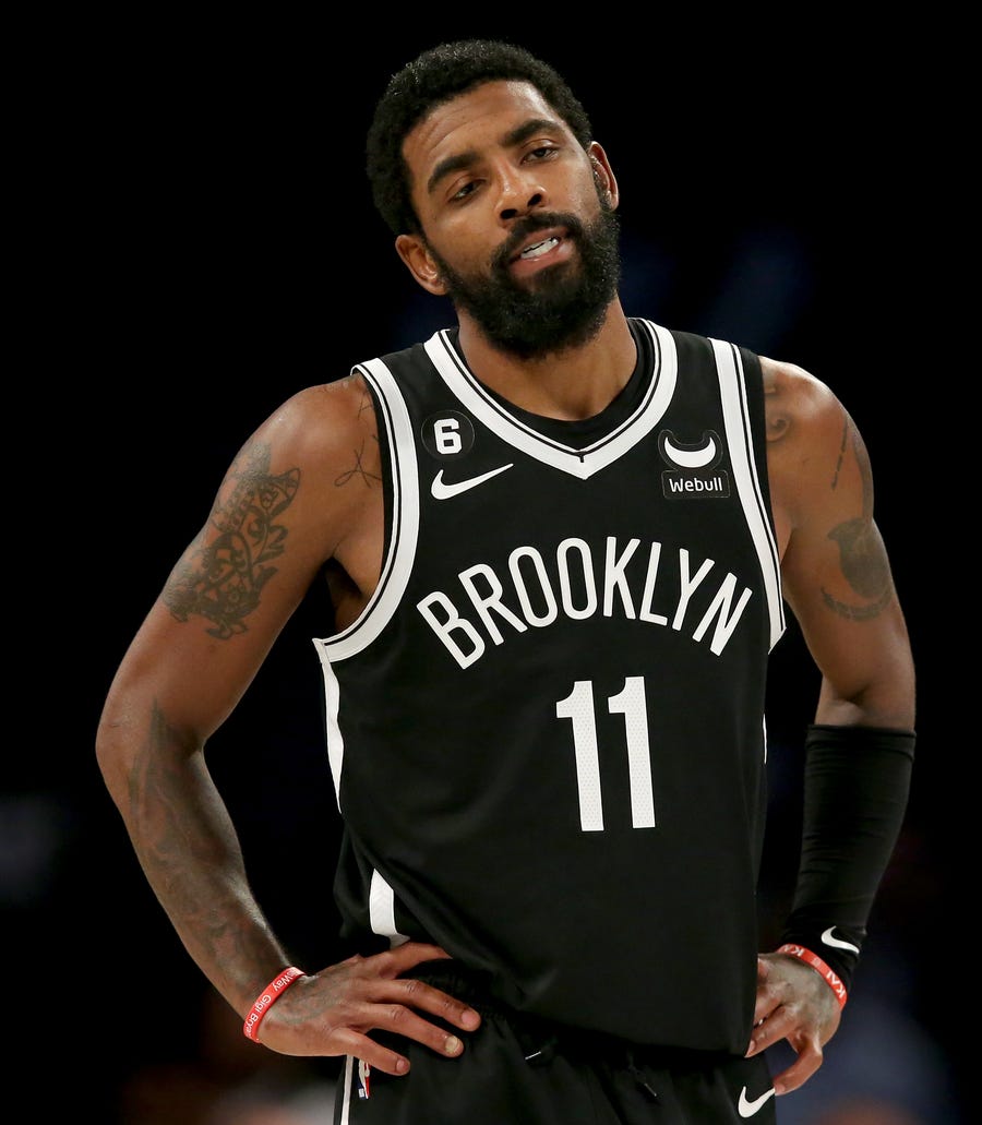 Kyrie Irving reacts during a game against the New Orleans Pelicans at Barclays Center on Oct. 19, 2022.