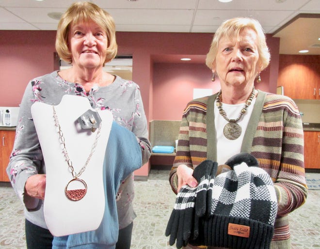 Betty Minteer, left, and Marcia Fleming, representing the Hammond-Henry Hospital Auxiliary, show some of the items to be included in the “Masquerade” $5 Jewelry and Accessories Sale planned by the Auxiliary.  The sale is from 7:30 a.m. to 4:30 p.m., Tuesday, Nov. 15, in the hallway at the east entrance to the hospital.  All jewelry items and accessories are sold for $5 each and all profits benefit the Auxiliary.  Cash, debit/credit cards and payroll deduction are accepted as payment at the sale.