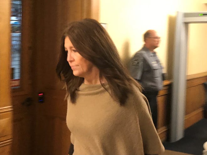 Former Fairfield Township Trustee Taletha Coles arrives at the Tippecanoe County Courthouse on Friday, Nov. 4, 2022, for her initial hearing. Grand jurors indicted Coles on 42 charges stemming from her time in office.