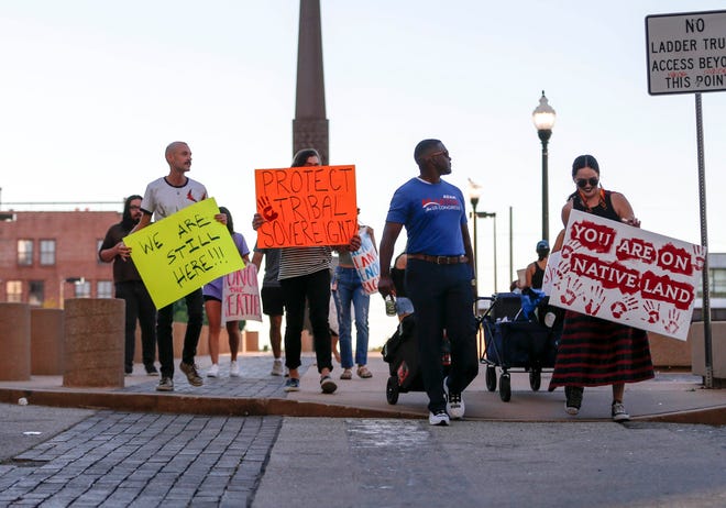 Protesters march to City Hall in response to Supreme Court's ruling in Tulsa, Okla.,on Thursday, June 29, 2022. The Supreme Court has ruled that Oklahoma can prosecute non-Native Americans for crimes committed on tribal land when the victim is Native American. The 5-4 decision on Wednesday cut back on the high court’s ruling from 2020 that said a large chunk of eastern Oklahoma remains an American Indian reservation. (Manuela Soldi/Tulsa World via AP) ORG XMIT: OKTUL102