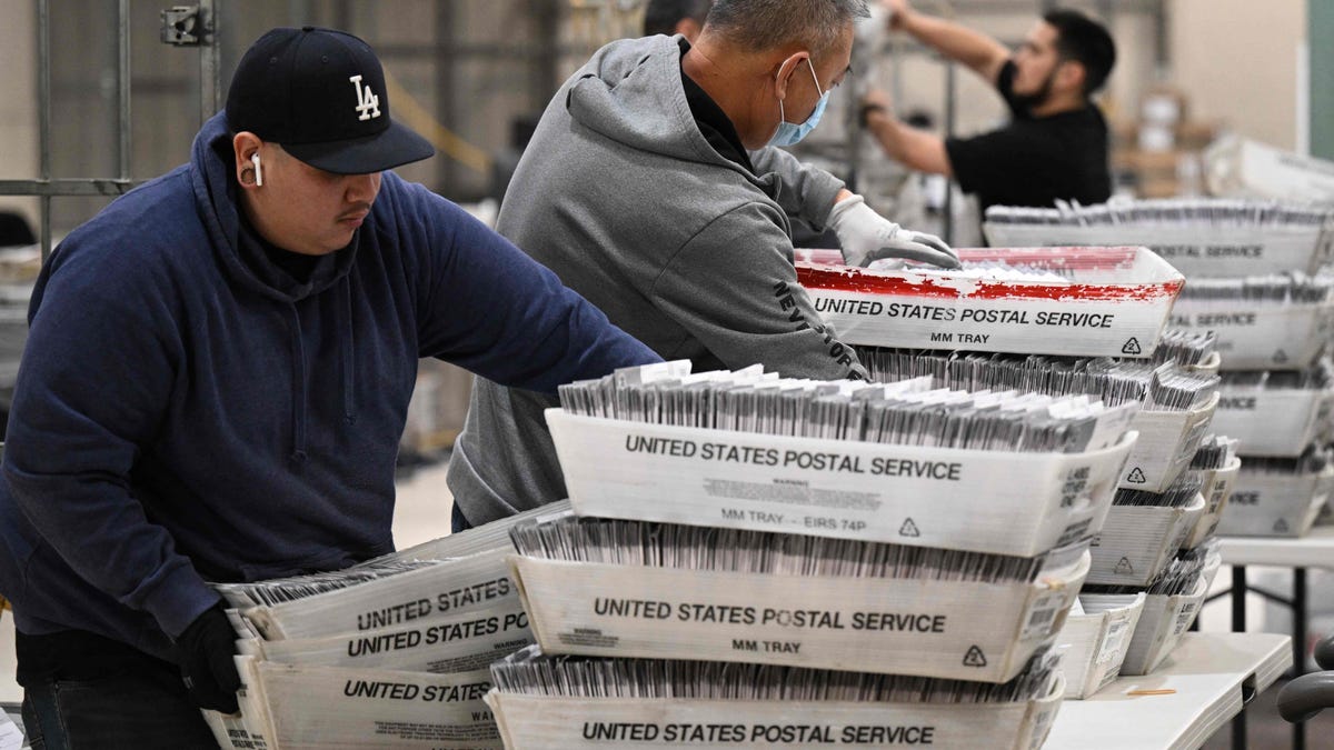 Election workers process vote-by-mail ballots in   Industry, Calif., on Nov. 4, 2022.