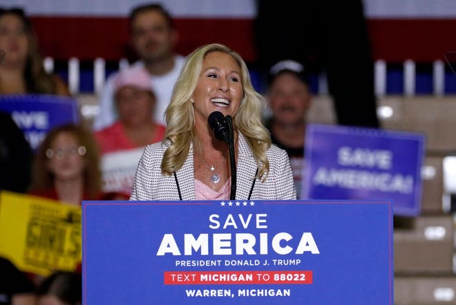 Rep. Marjorie Taylor Greene, R-Ga., speaks during former US President Donald Trump's Save America rally at Macomb County Community College Sports and Expo Center in Warren, Michigan.