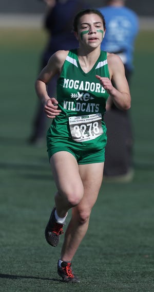 Mogadore's Katie Lane placed 28th in the Girls Div III at the Cross Country State Championships at Fortress Obetz and Memorial Park on Saturday in Obetz.  [Mike Cardew/Akron Beacon Journal]  Photo taken on Monday, Nov. 1, 2022