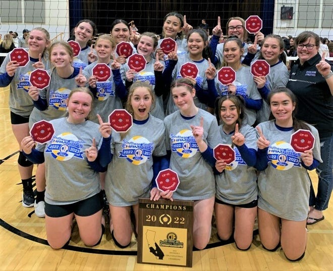 The Excelsior volleyball team poses for a photo after winning the CIF-Southern Section Division 9 title Friday night.
