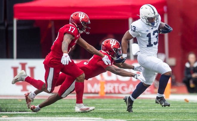 IPenn State's Kaytron Allen (13) avoids Indiana's Tiawan Mullen (3) during the first half of the Indiana versus Penn State football game at Memorial Stadium on Satruday, Nov. 5, 2022.

Iu Psu Fb Allen 1