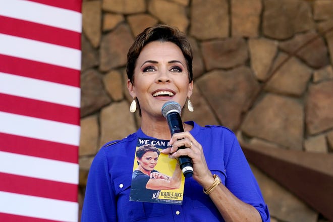Republican gubernatorial candidate Kari Lake speaks to supporters at a campaign event in Queen Creek, Ariz., Wednesday, Oct. 5, 2022. Lake will face Democrat Katie Hobbs in the general election in November.