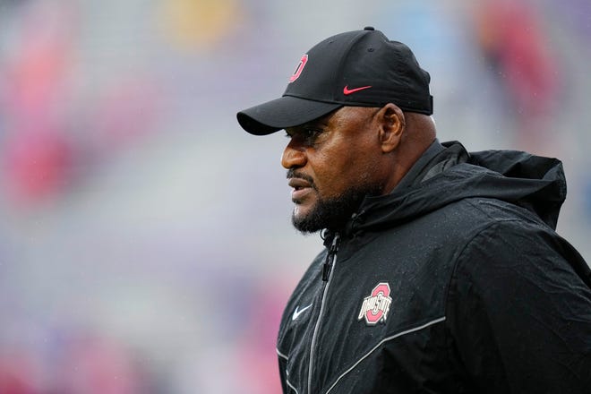 Nov 5, 2022; Evanston, Illinois, USA; Ohio State Buckeyes defensive line coach Larry Johnson takes the field prior to the NCAA football game against the Northwestern Wildcats at Ryan Field. Mandatory Credit: Adam Cairns-The Columbus Dispatch