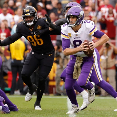 Minnesota Vikings quarterback Kirk Cousins (8) scr