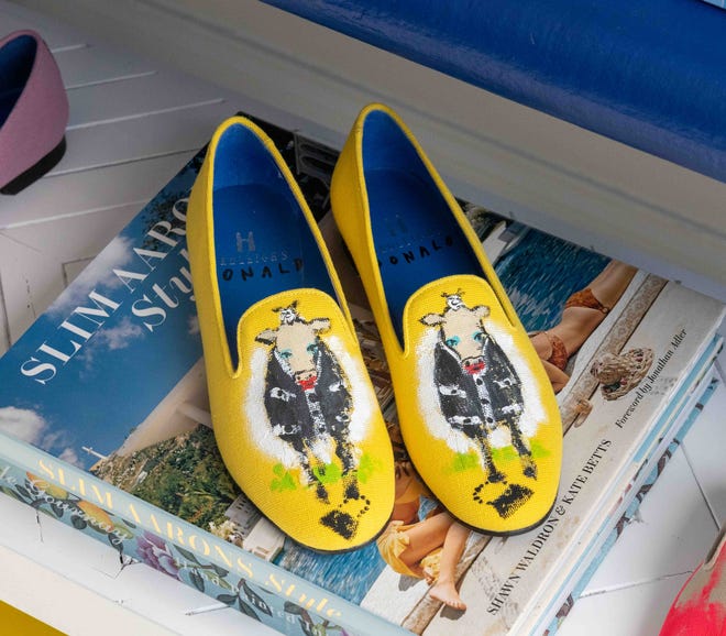 Hand-painted Hadleigh shoes by artist Donald Robertson inside the brand's 209 Royal Poinciana Way location on opening day, Monday.