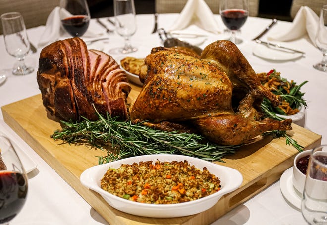 Roast turkey and honey-glazed ham for Thanksgiving.
