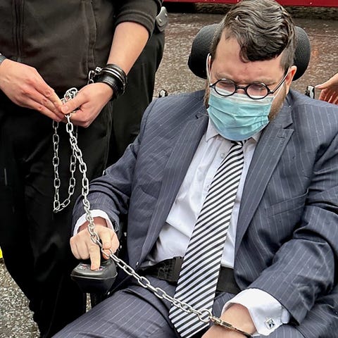 Nick Alahverdian is led into Edinburgh Sheriff Cou