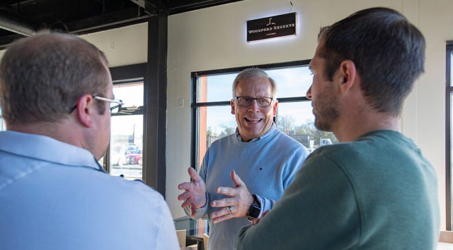 State Sen. Dave Syverson, R-Cherry Valley, chats with Winnebago County Board candidates Michael Thompson, left, and John F. Sweeny, right, on Monday, Nov. 7, 2022, during a ribbon-cutting event at Baked Wings in Loves Park. Syverson is unopposed in Tuesday's election.