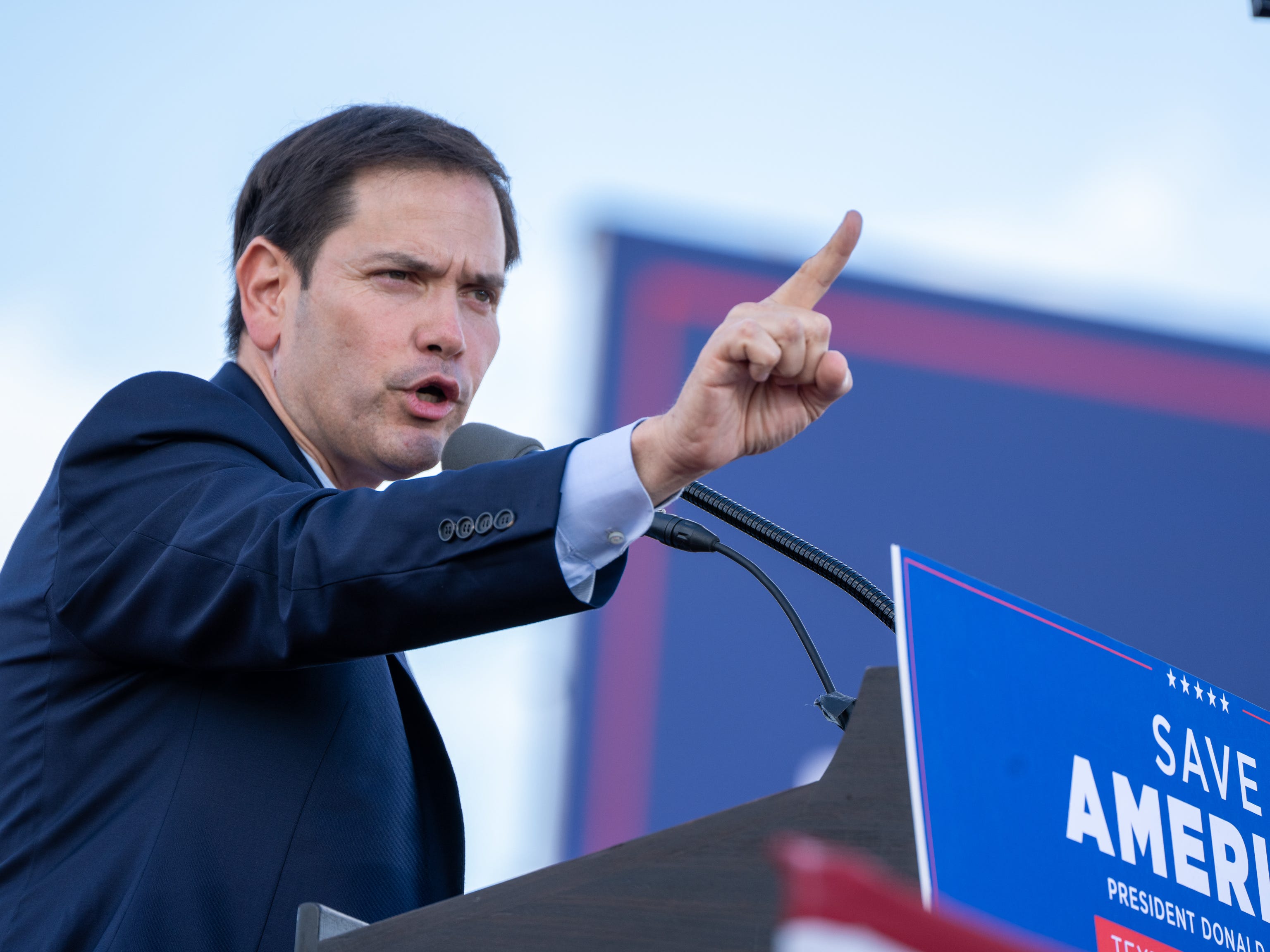 Rally goers, 45th President Donald Trump and Marco Rubio are seen at the Save America Rally at the Miami Dade County Fair and Expo in Miami on Sunday November 6, 2022. ORG XMIT: 2634540 (Via OlyDrop)