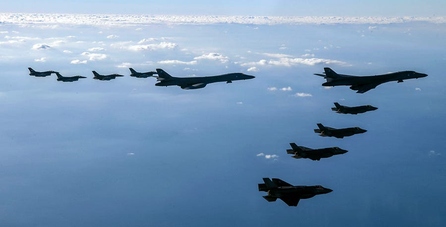 Two U.S. Air Force B-1B heavy bombers and fighter jets from U.S. and South Korean fly over South Korea during "Vigilant Storm, " a joint air drill on Nov. 5 after a blitz of missile launches by North Korea.