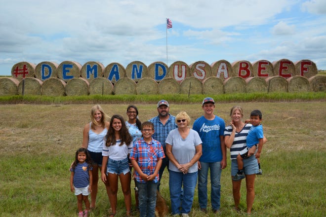 Brett and his wife, Jessy are pictured with their children and Brett's mom, Millie Kenzy. Brett is a Veteran. He and his brother, George raise cattle and operate a feedlot near Gregory, South Dakota.