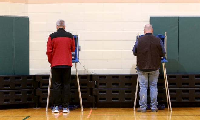 Voters cast ballots Tuesday, Nov. 8, 2022, in Northpoint Elementary School voting center in Granger.
