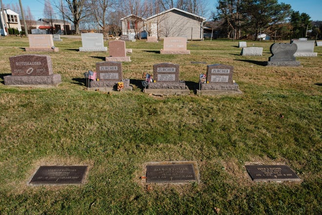 Part of the Zurcher family plot can be seen near the gravesite of Orion D. Zurcher and family, Tuesday, Nov. 8 at Greenlawn Cemetery in Wilmot.