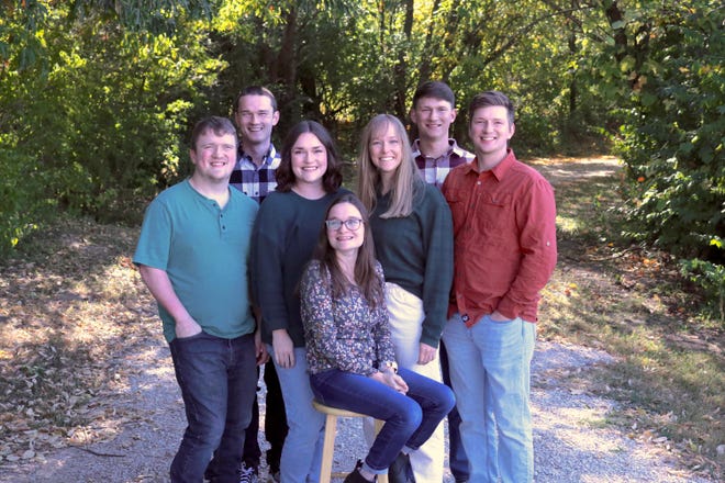From left, the McCaughey septuplets shown in October 2022, a month before their 25th birthdays: Nathan (light blue), Joel (black and white checkered), Kelsey (green), Alexis (floral), Natalie (green), Brandon (maroon and white checkered) and Kenny (orange). The septuplets were born Nov. 19, 1997 in Des Moines, Iowa.