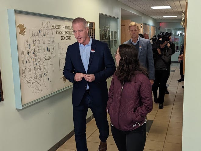 Rep. Sean Patrick Maloney, left, departs the North Highlands fire house in Philipstown after voting with his husband, Randy, and campaign communications director Mia Ehrenberg.