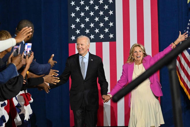 President Joe Biden and First Lady Jill Biden arrive for a rally for gubernatorial candidate Wes Moore and the Democratic Party on the eve of the US midterm elections, at Bowie State University in Bowie, Maryland, on November 7, 2022.