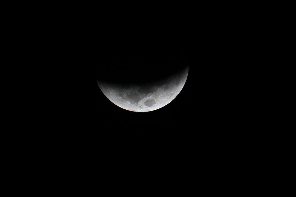 The moon is seen during a total lunar eclipse in Villa Nueva, Guatemala on November 8,2022.