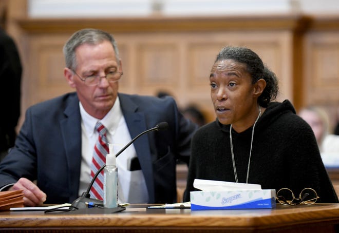 Dennis Barr, of the Stark County Prosecutor's Office, looks on as Leandra Cameron of Alliance reads an impact statement about the loss of Terrell Lipkins Sr. Teens Craig Avery and Ajani Smith were convicted of killing Lipkins and sentenced Wednesday in Stark County Common Pleas Court by Judge Natalie Haupt.
(Photo: Julie Vennitti Botos)