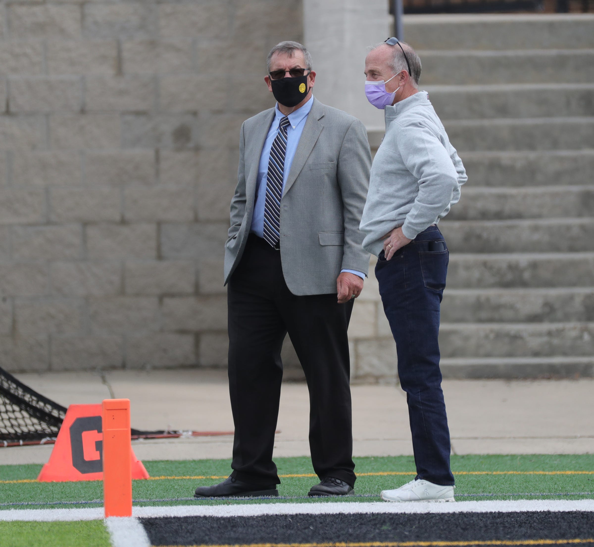 Adrian College Athletic Director Michael Duffy and school President Jeffrey Docking on the field during action against Trine University on October 3, 2020, at Docking Stadium in Adrian Michigan.