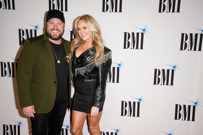 Mitchell Tenpenny and Meghan Patrick arrive at the red carpet for BMI's 2022 Country Awards.
