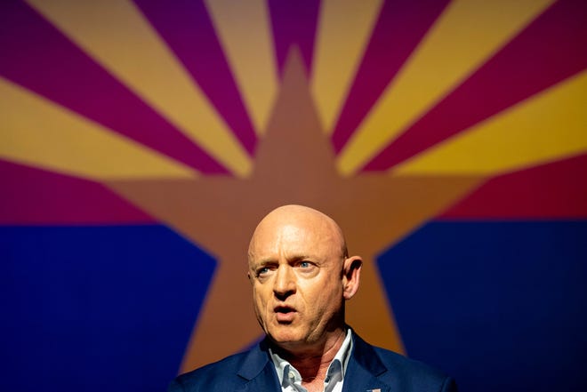 Sen. Mark Kelly, D-Ariz., speaks during an Election Day rally at the Rialto Theatre in Tucson on Nov. 8, 2022.