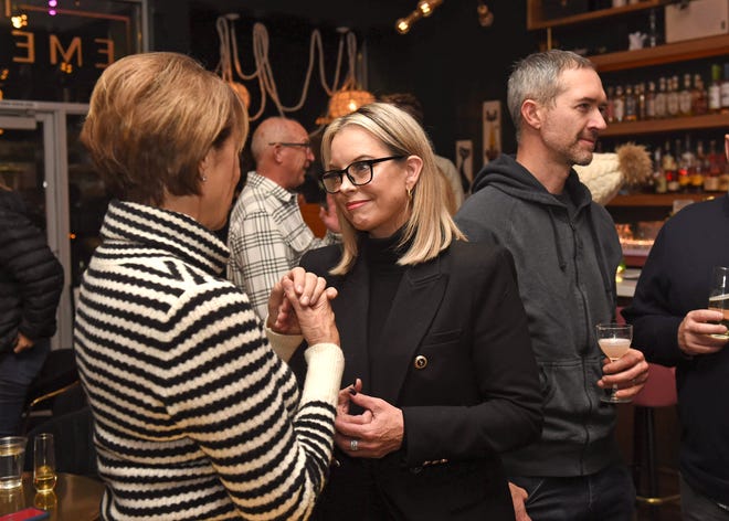 Mayor Hillary Schieve talks with Pam Matteoni at her election watch party at The Emerson on election night Nov. 8, 2022 