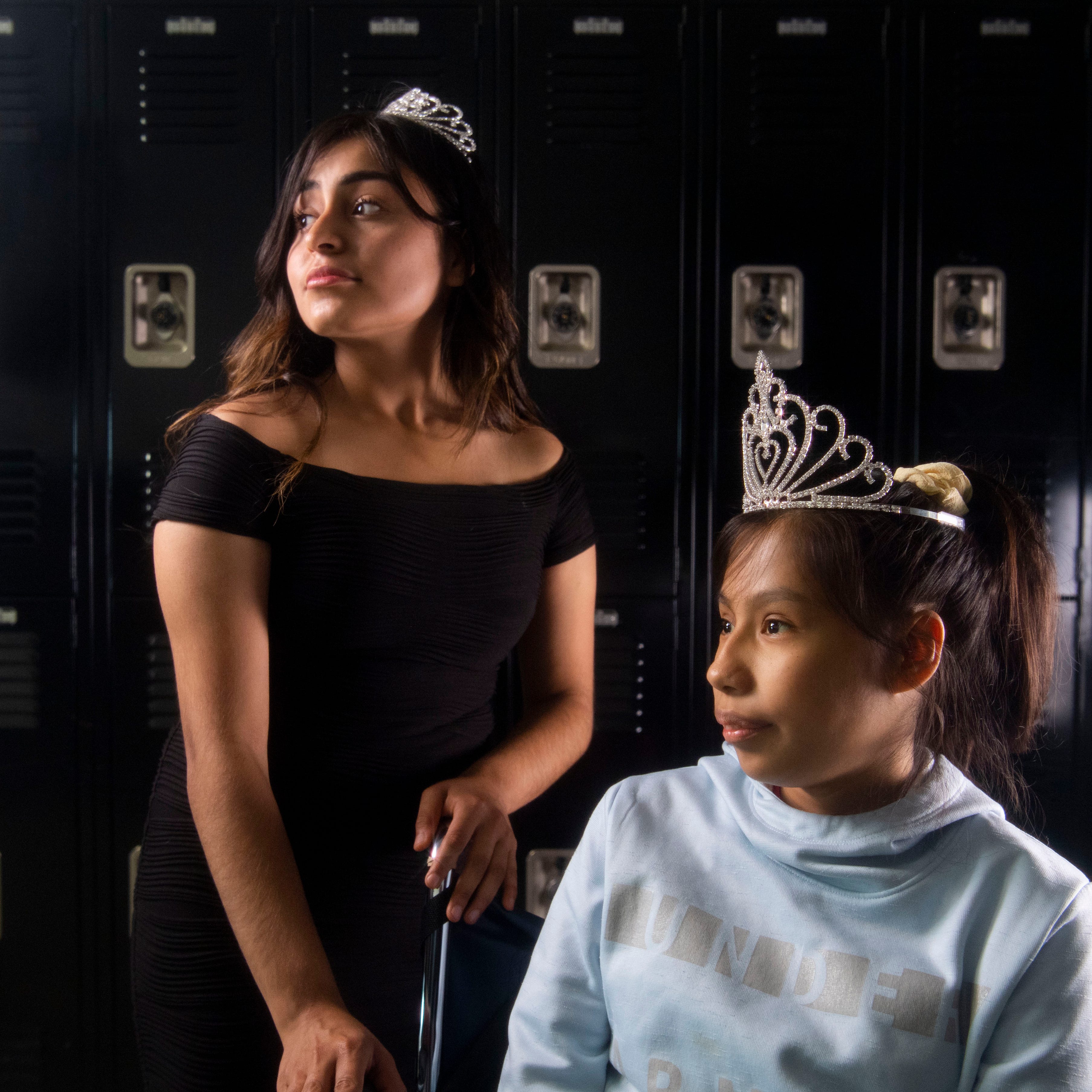 Former homecoming queen Juleydi Franco Ramos stands next to the new homecoming queen, Liliana Pahuamba Roque at Crossville High School  in Crossville, Alabama, Thursday, Nov. 3, 2022.