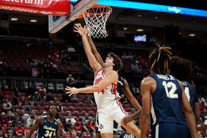 Nov 10, 2022; Columbus, OH, USA;  Ohio State Buckeyes guard Owen Spencer (44) shoots over Charleston Southern Buccaneers forward Cheikh Faye (34) during the second half of the NCAA men's basketball game at Value City Arena. Ohio State won 82-56. Mandatory Credit: Adam Cairns-The Columbus Dispatch
