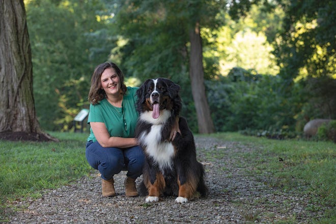 Kate Quickel with her Bernese mountain dog, Penny, at Thaddeus Kosciuszko Park in Dublin.
