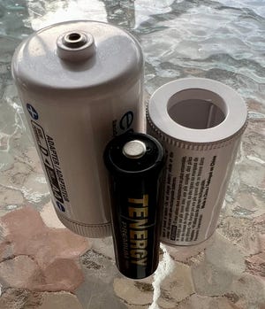 Sleeves and spacers turn AA or AAA batteries into C- or D-cell Sleeves and spacers turn AA or AAA batteries into C- or D-cell
