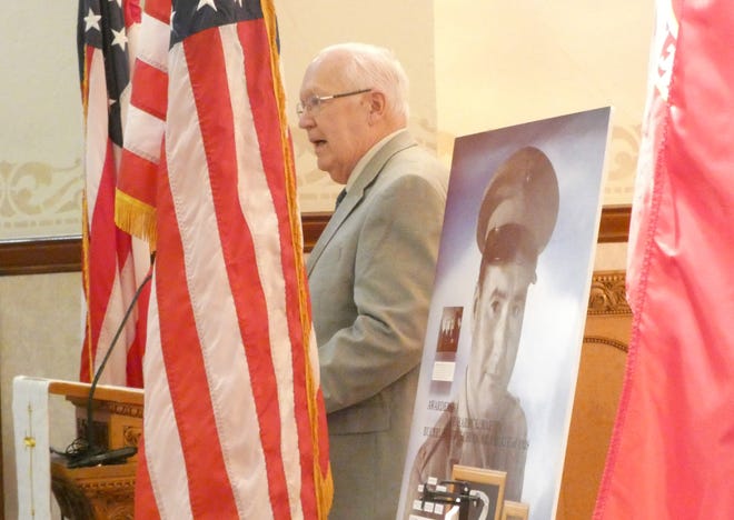 Dr. John Kurtz, president of the Bucyrus Historical Society, speaks during a special Veterans Day ceremony Friday at St. Paul's Lutheran Church. The ceremony paid special tribute to Congressional Medal of Honor winner 1st Lt. Harry L. Martin.