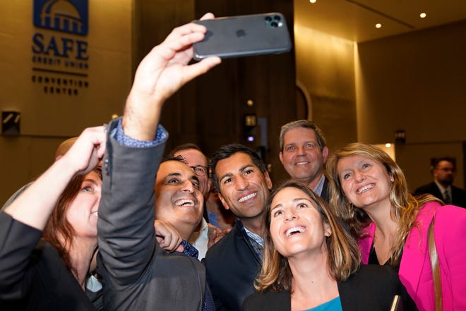 Assemblyman Robert Rivas, D-Salinas, center, takes a selfie with other Assembly Democrats after being elected Speaker-Designee on Thursday, Nov. 10, 2022.